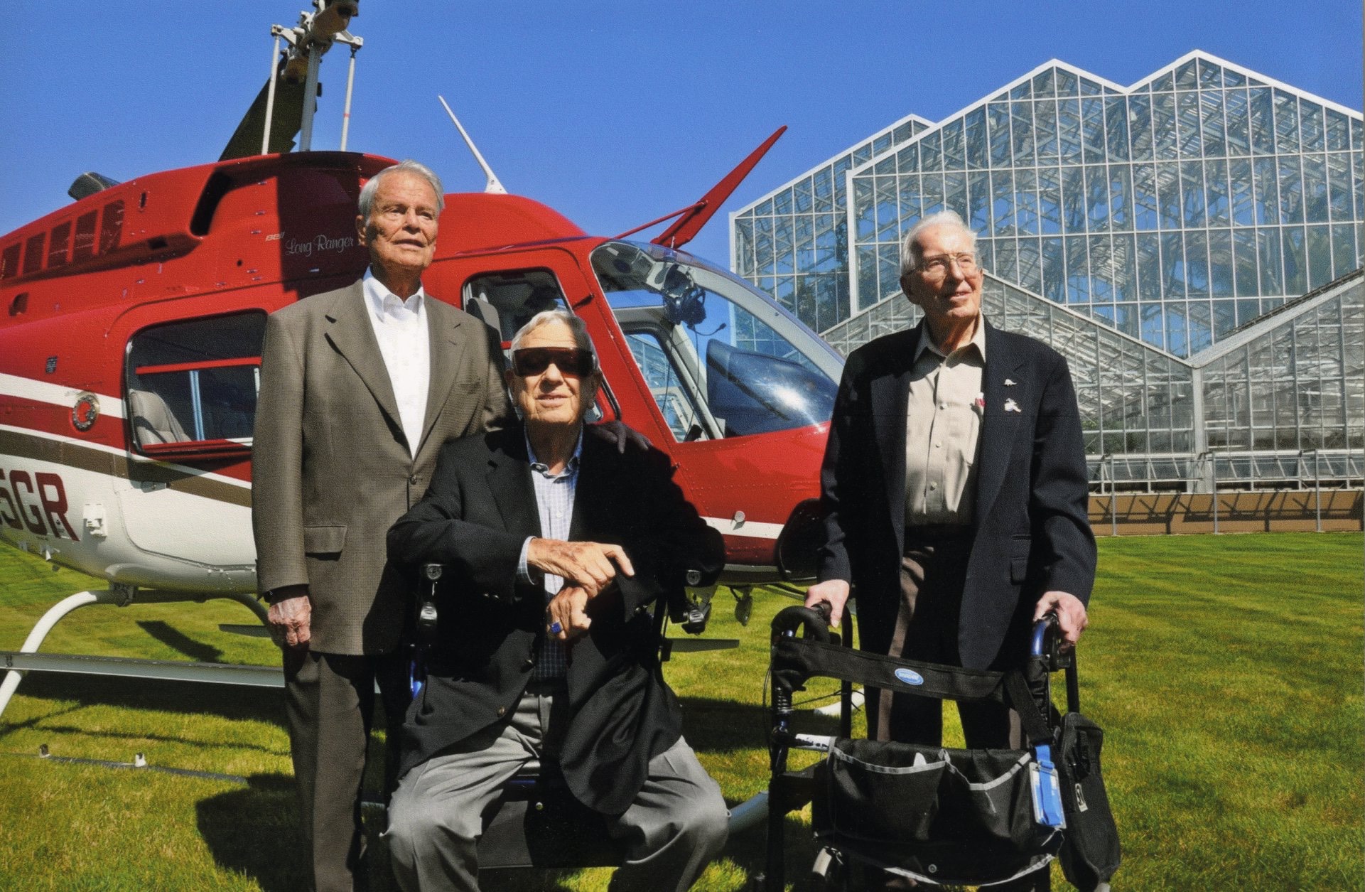 Ralph and Peter Cook in front of helicopter